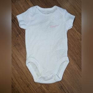 Nike White Baby Bodysuit with Light Pink Swoosh